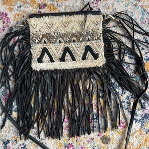 Rebecca Minkoff  black leather fringe purse with beaded details.